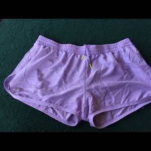 Purple Under Amour running shorts